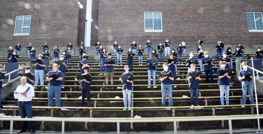 The varsity choir pre-recorded the concert on the football stands to simulate a concert experience. The video was sent out over a Google Meet to parents and students. 