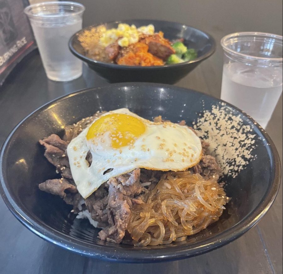 Bagpipe+news+editor+Elle+Polychronis+visits+Burning+Rice+to+try+out+their+bowls.+Her+order+consisted+of+a+regular+bowl+with+white+rice%2C+japchae%2C+bulgogi+and+a+sunny+side-up-egg.+She+recommends+giving+the+restaurant+a+try.