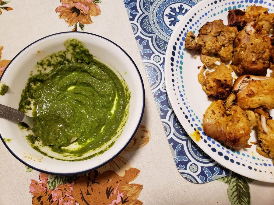 The+chicken+tikka+BBQ+sits+beside+the+cilantro+chutney%2C+freshly+plated.++It+was+the+gift+of+choice+for+my+cousin+when+my+family+met+her+newborn+son.