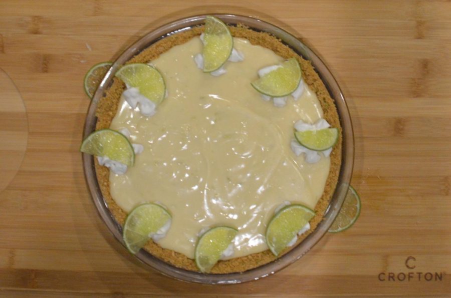 Sliced limes rest on top of dollops of whipped cream on the Key lime pie. The pies filling was creamy and tart.
