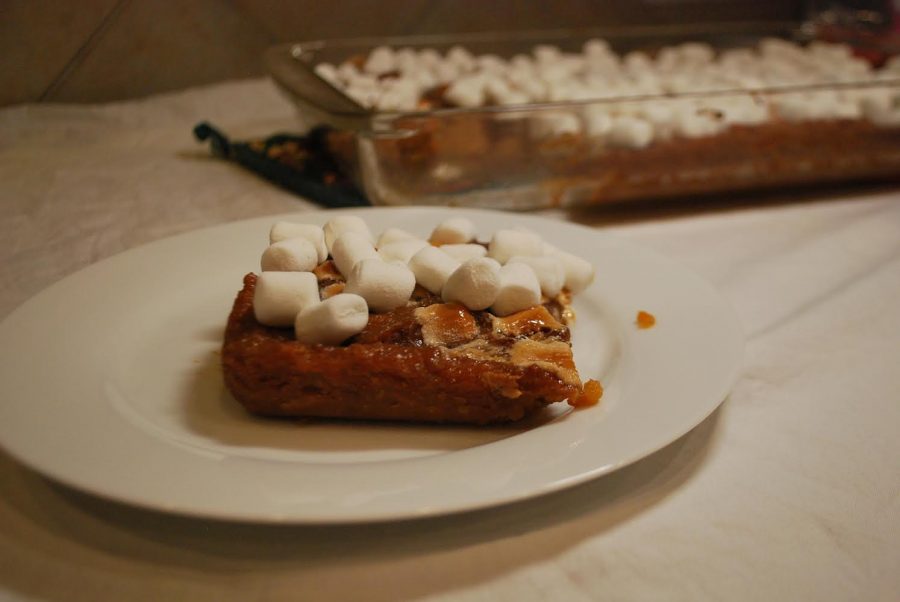 Soft+marshmallows+sprawl+across+a+slice+of+mashed+sweet+potato+casserole.+The+sweetness+of+the+marshmallows+combined+with+the+caramelized+sweet+potato+to+make+a+dessert+that+will+satisfy+any+sweet+tooth.