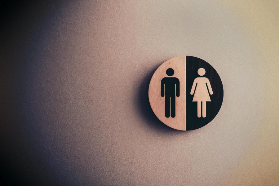 A plaque divides men and womens locker rooms. As of Jan. 18, transgender girls will have to compete as the gender they were assigned at birth because of House Bill 25.

