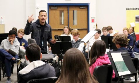 During his workshop, songwriter Michael Gomez plays a song to make a point about the importance of the songs title. Gomezs workshop focused on teaching students how to write meaningful music. 