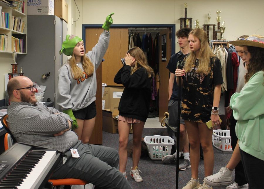 In preparation for an upcoming production, theater teacher Tyler Perring strategizes with Theater 2 students sophomores Nola Carroll, Mckinley Meece, Tucker Mattison, Clara Schwartzendruber, Nelle Blaylock and Laci Rosen, who sport various props from the closet. Perring initially had low hopes for the task force because it included only two teachers, but after the addition of more teachers he’s open to changing his mind. “If they actually listen to the teachers on the task force, it can have a great effect,” Perring said. “But if history says anything I don't imagine it will affect much.”