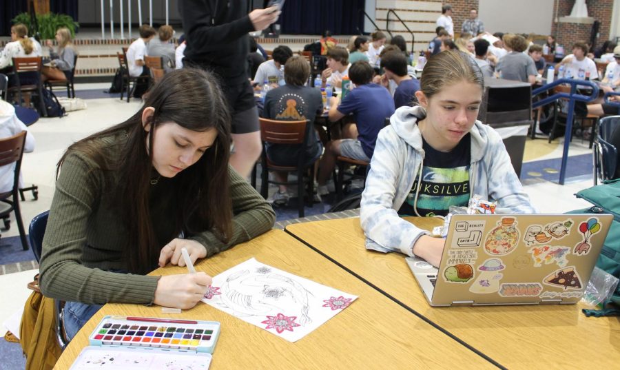 During lunch, Freshmen Sasha Ephanov and Elise Pankratz work on school work. The students are among the student population represented by the new rankings released. 