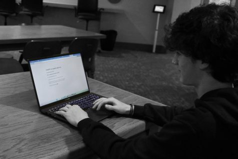 During his study hall, sophomore Corbin Monk explores the ChatGPT website. Monk says hes against any forms of plagiarism, especially artificial intelligence. It just defeats the purpose of writing an essay if youre just going to get an AI to write it for you, Monk said.