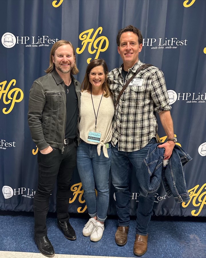 Before LitFest workshops began, alumni and songwriter Benji Harris, committee member Laurie Johansen and screenwriter Kurt Voelker pose together in front of the LitFest backdrop. Harris and Voelker both hosted workshops for students while Johansen serves on the committee that arranges the event each year.  